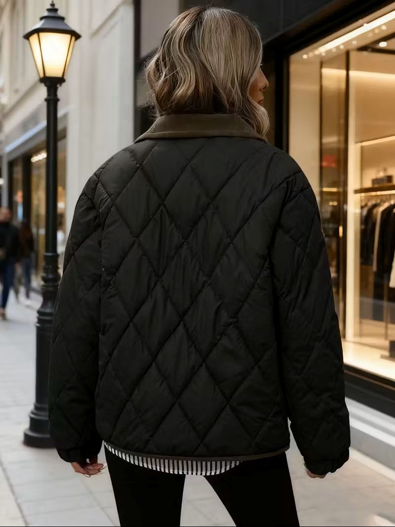 Women’s quilted winter jacket in black – back view, tailored silhouette