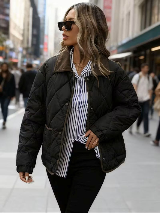 Women’s quilted winter jacket in black – front view, thermal lining and corduroy collar