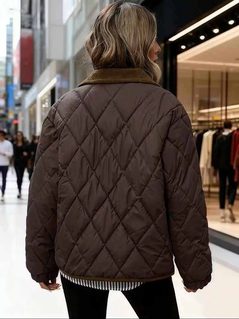 Women’s quilted winter jacket in brown – back view, elegant tailored fit