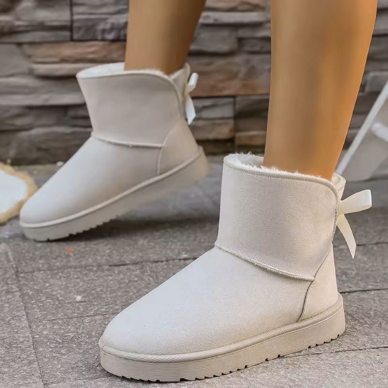 Elara fur-lined winter boots in white with plush detail